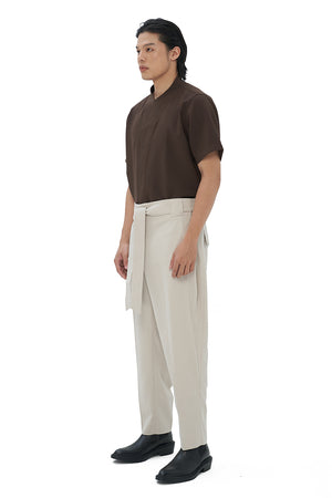 BEIGE LOOSE PANTS WITH SNAP BUTTON PLEATED WAISTBAND